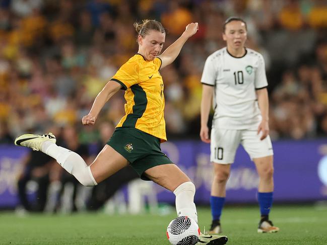 MELBOURNE, AUSTRALIA - FEBRUARY 28: Clare Hunt of Australia kicks the ball during the AFC Women's Olympic Football Tournament Paris 2024 Asian Qualifier Round 3 match between Australia Matildas and Uzbekistan at Marvel Stadium on February 28, 2024 in Melbourne, Australia. (Photo by Kelly Defina/Getty Images)