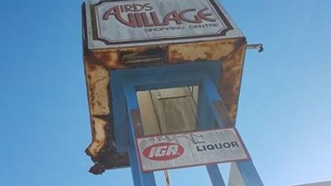 An Airds resident is concerned about debris falling from the Airds Village Shopping Centre sign.