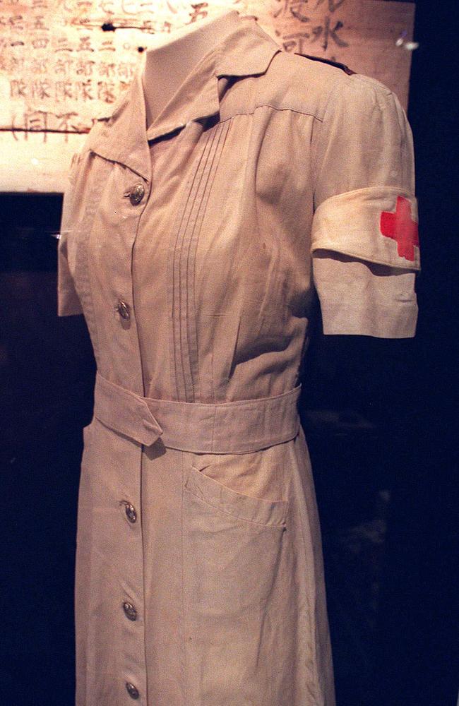 History on display … the uniform worn by Vivian Bullwinkel when she was shot at Bangka Island. A bullet hole is visible just above the belt, slightly masked by a fold in this picture. She had to hide the hole from her Japanese captors later in case they realised she had witnessed a war crime.