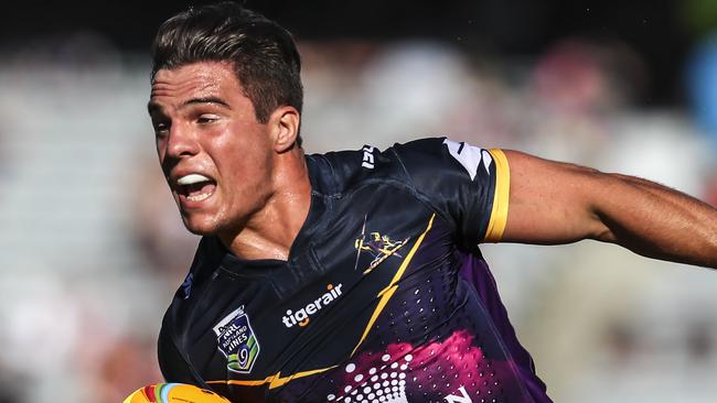 AUCKLAND, NEW ZEALAND — FEBRUARY 04: Brodie Croft of the Storm beats the tackle of Jordan Rankin of the Tigers during the 2017 Auckland Nines match between the Wests Tigers and the Melbourne Storm at Eden Park on February 4, 2017 in Auckland, New Zealand. (Photo by Simon Watts/Getty Images)