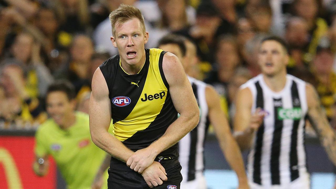 Jack Riewoldt grabs his wrist after landing awkwardly in a marking contest. Photo: Michael Klein.