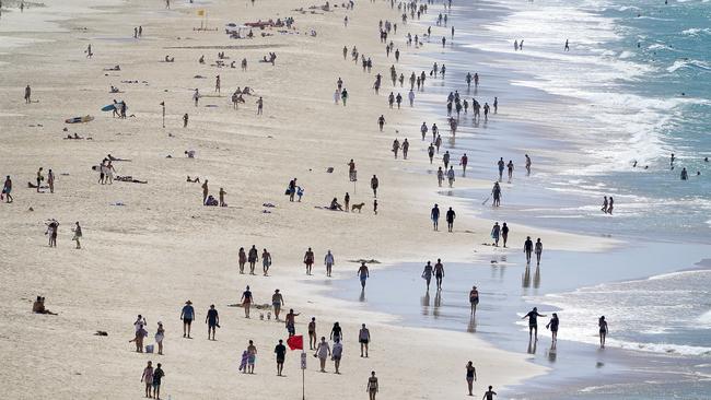 Gold Coast beaches are still jam packed, despite COVID-19 restrictions. Picture: Dave Hunt/AAP