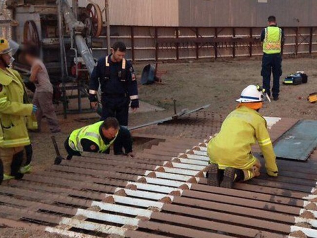 Rescuers at the scene where a man was trapped underground by grain. Courtesy RACQ CareFlight Rescue