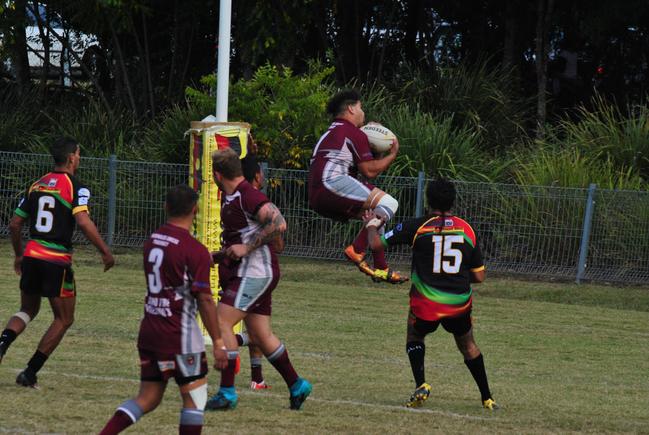 Rugby league Casino Cougars Corey Torrens takes a sensational bomb from Northern.