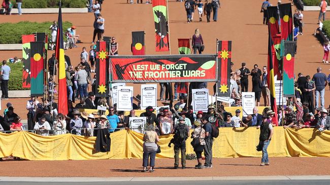 People take part in a Lest We Forget the Frontier Wars march near the Australian War Memorial in 2016. Picture Kym Smith