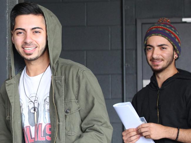 Two of the Jalal Brothers leaving police headquarters in Spencer St, Melbourne. Picture: David Crosling