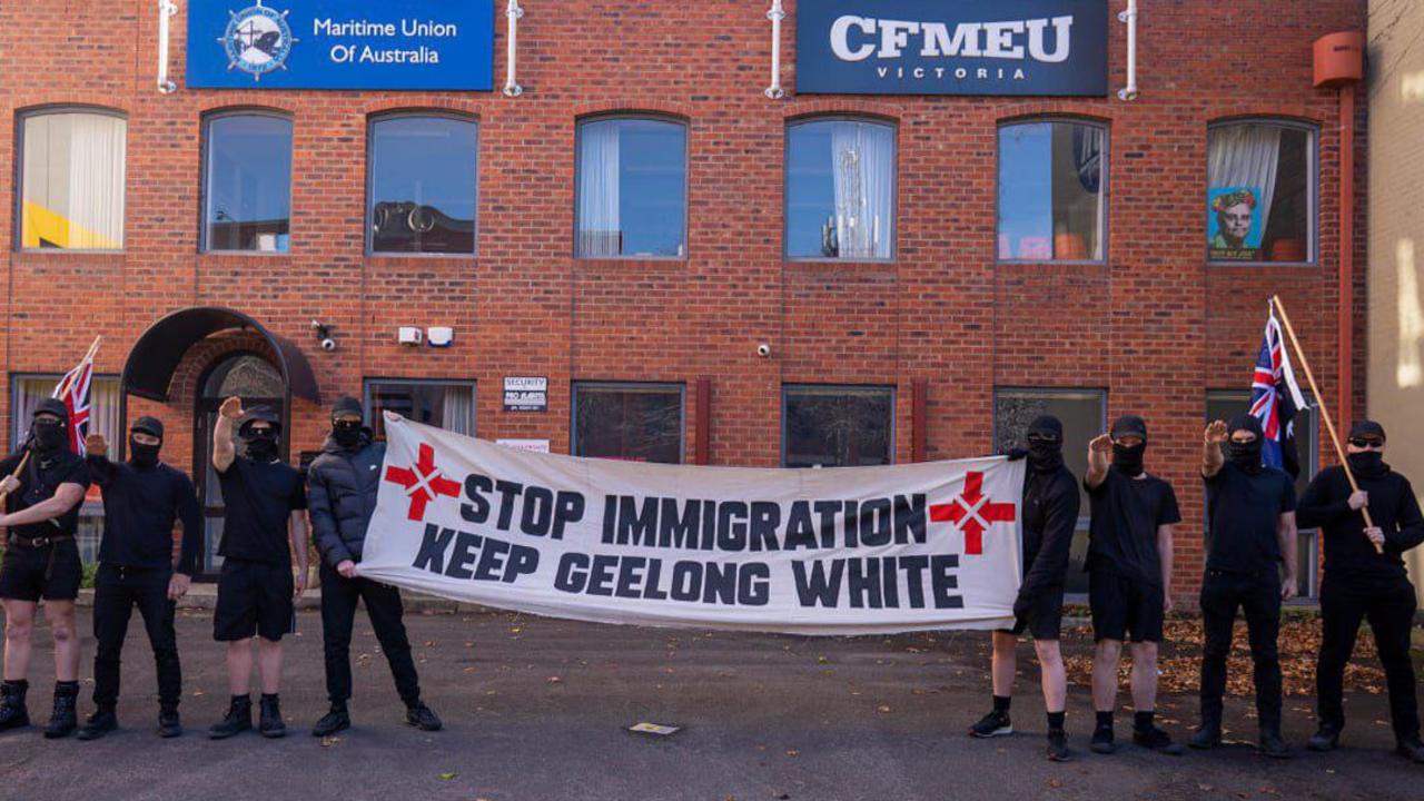 Members of the National Socialist Network pose in front of the CFMEU building in Geelong.