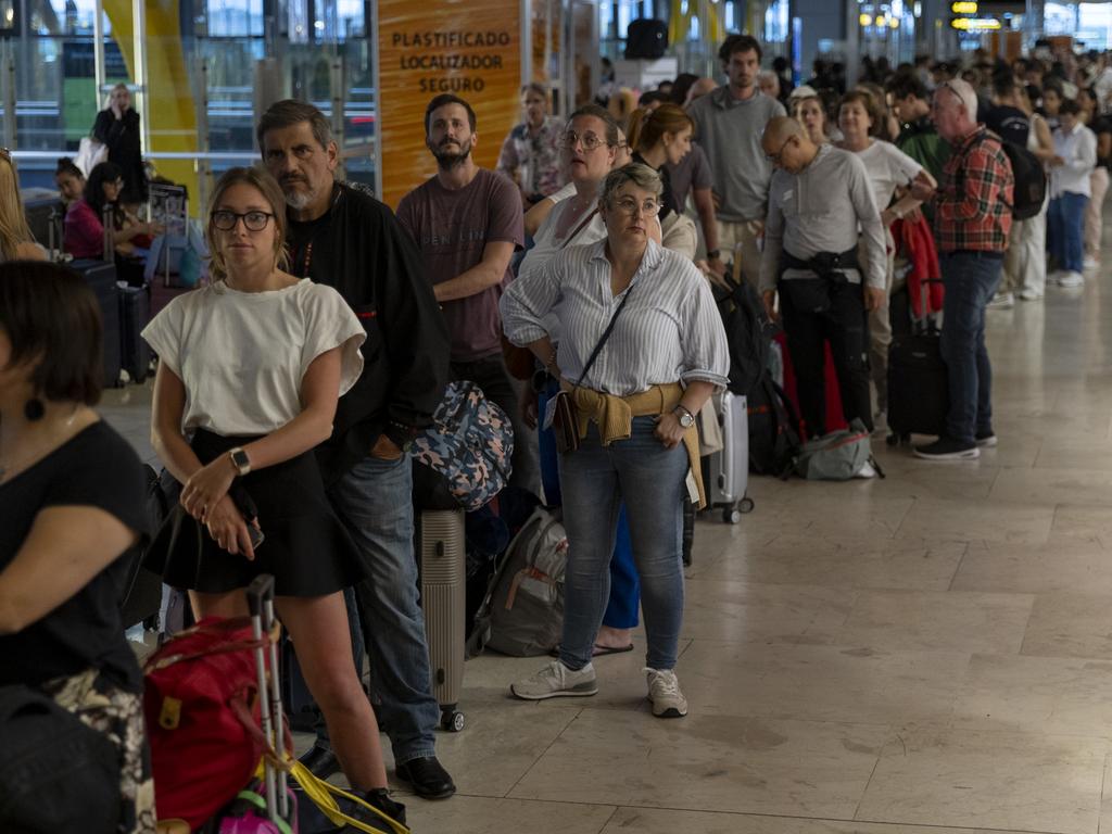 Travellers queue for customer care service at Barajas Airport. Picture: Pablo Blazquez Dominguez/Getty Images