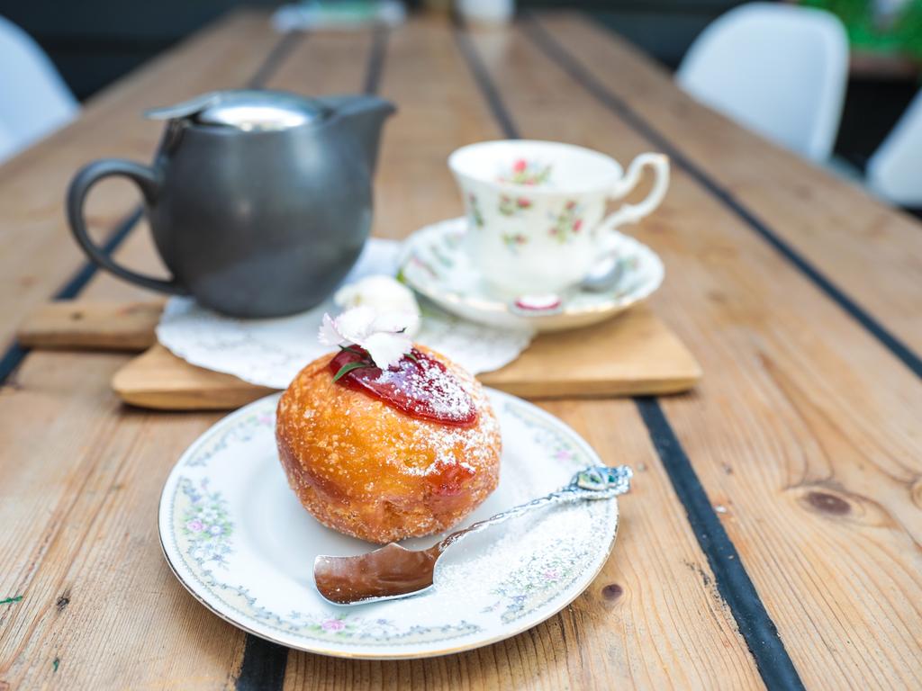 Gluten-free jam doughnut with tea. Picture: Mireille Merlet