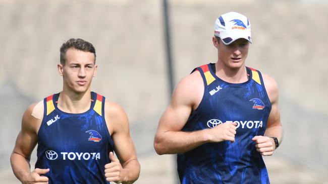 Crows players Tom Doedee and Alex Keath train together at Football Park. They will be both be in a race to replace Jake Lever in defence next year. Picture: Tricia Watkinson