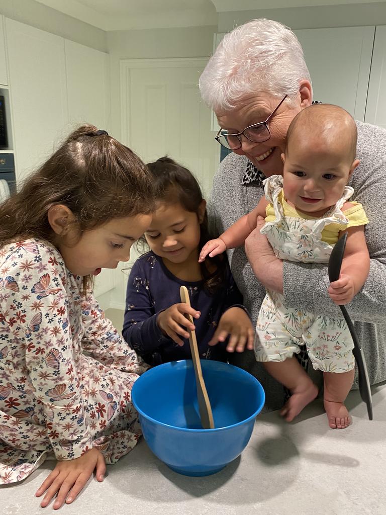 Griffith University Emeritus Professor Anneke Fitzgerald says there are mental and physical benefits for all ages when young and old come together and share stories. Professor Fitzgerald is pictured with grandchildren from left Lilly-Janna, Brianna-Rose and baby Miyana. Picture: supplied