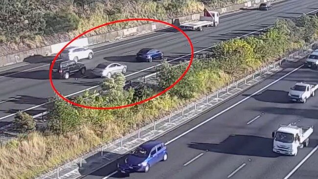 The Tesla and the VW on the M1.