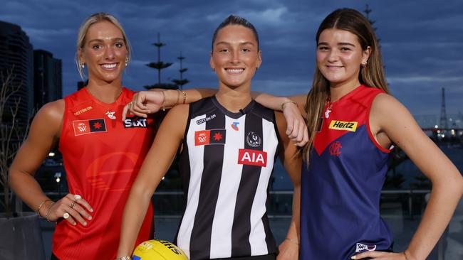 MELBOURNE, AUSTRALIA - DECEMBER 16: Top 3 draft picks Ash Centra of the Magpies (C), Havana Harris of the Suns (L) and Molly O'Hehir of the Demons pose during the 2024 Telstra AFLW Draft at Marvel Stadium on December 16, 2024 in Melbourne, Australia. (Photo by Dylan Burns/AFL Photos via Getty Images)