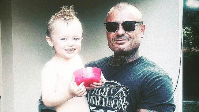 Adam with his son who he is building a family home for. Picture: Supplied