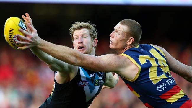 AFL - Showdown 38 - Adelaide Crows v Port Adelaide at Adelaide Oval. Matthew Lobbe and Sam Jacobs. Photo Sarah Reed