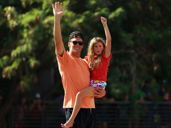 Tom Brady celebrates with his daughter Vivian during the Tampa Bay Buccaneers Super Bowl boat parade. Picture: Mike Ehrmann/Getty Images