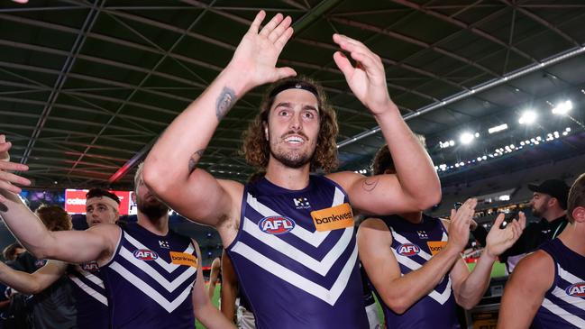 MELBOURNE, AUSTRALIA - MARCH 23: Luke Jackson of the Dockers leaves the field after a win during the 2024 AFL Round 2 match between the North Melbourne Kangaroos and the Fremantle Dockers on March 23, 2024 in Melbourne, Australia. (Photo by Dylan Burns/AFL Photos via Getty Images)