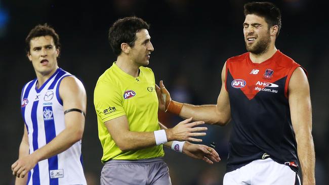 Chris Dawes talks to umpire Jordan Bannister after giving away a free kick.