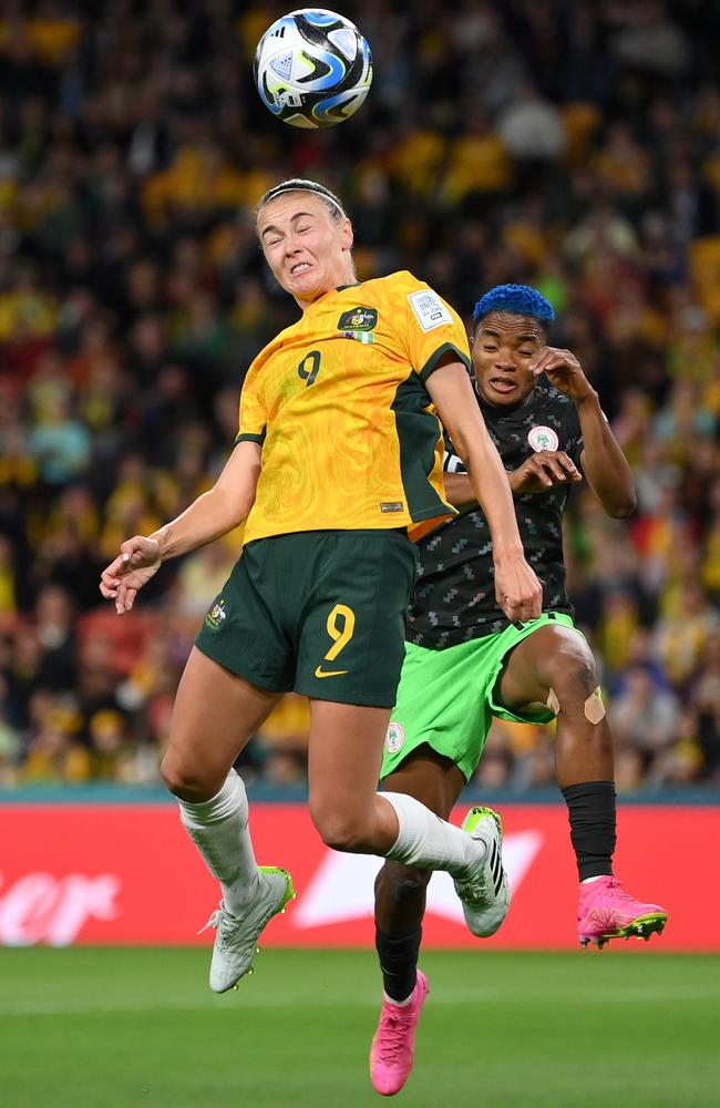 Rasheedat Ajibade of Nigeria challenges Caitlin Foord, who is playing a lone hand for Australia up front amid an injury crisis. Picture: Justin Setterfield/Getty Images