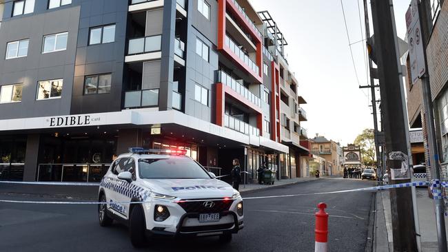 The Brunswick apartment block was taped off after violence erupted. Picture: Nicki Connolly