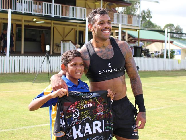 Simpson with Indigenous All Star Josh Addo-Carr.