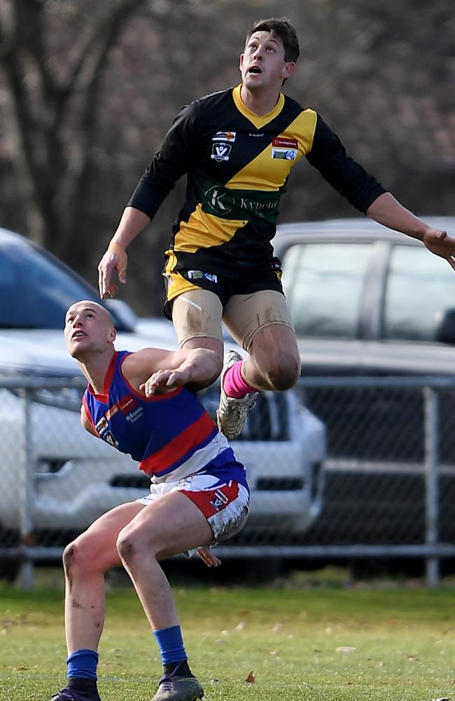 Harrison Huntley try to take screamer over Jake Conolan on Saturday. Picture: Andy Brownbill