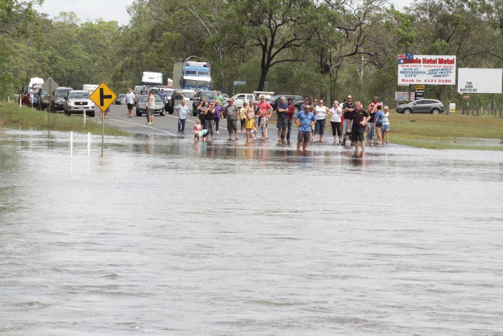 Motorists stranded on the Maryborough side of Saltwater Creek on the Bruce Highway. Photo: Robyne Cuerel / Fraser Coast Chronicle. Picture: Robyne Cuerel