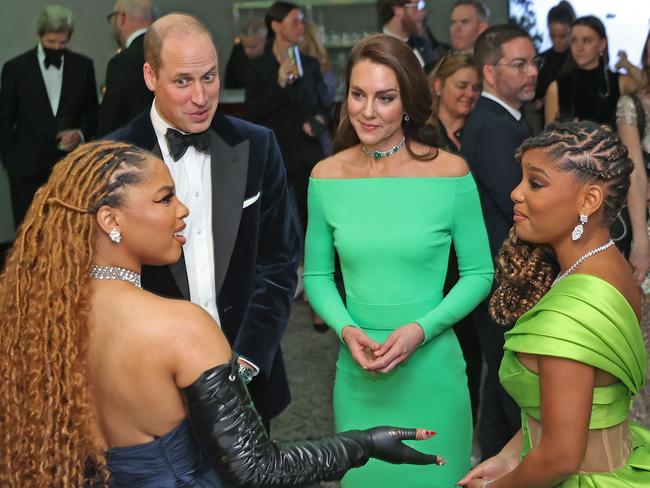 Britain's Prince William, Prince of Wales and Catherine, Princess of Wales, talk with US singer Chloe Bailey (L) and Halle Bailey (R), after attending the second annual Earthshot Prize Awards ceremony at the MGM Music Hall in Boston, Massachusetts on December 2, 2022. (Photo by David L. RYAN / POOL / AFP)