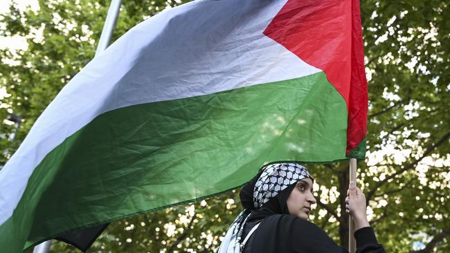 Dozens of Palestinian flags were seen flying in support. Picture: NCA NewsWire / Martin Ollman