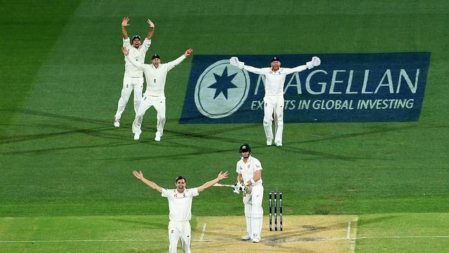 England bowler Chris Woakes celebrates the wicket of Australian captain Steve Smith on Day 3 of the Second Test match between Australia and England at the Adelaide Oval in Adelaide, Monday, December 4, 2017. (AAP Image/Dave Hunt) NO ARCHIVING, EDITORIAL USE ONLY, IMAGES TO BE USED FOR NEWS REPORTING PURPOSES ONLY, NO COMMERCIAL USE WHATSOEVER, NO USE IN BOOKS WITHOUT PRIOR WRITTEN CONSENT FROM AAP