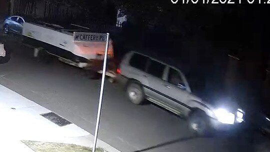 CCTV image of a Toyota LandCruiser towing away a stolen Jayco Outback Swan camper trailer on January 1.