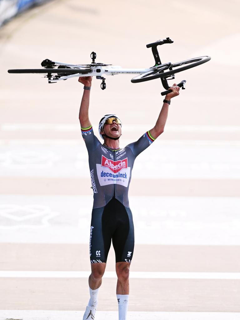 Mathieu Van Der Poel celebrates at finish line as race winner in the Roubaix Velodrome - Andre Petrieux. (Photo by Luc Claessen/Getty Images)