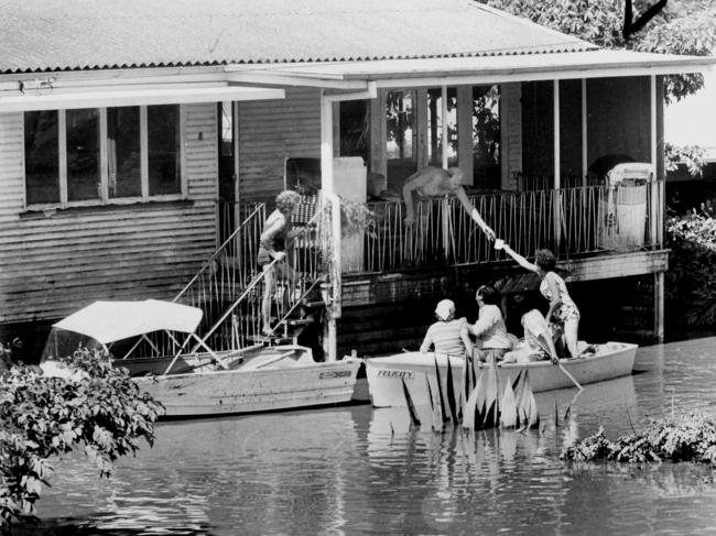 Among the flood victims who returned home as the floodwater receded were Mr. Mansell Lyne’s family including Betty who came back to their house in Aranui St, Yeronga, by boat.