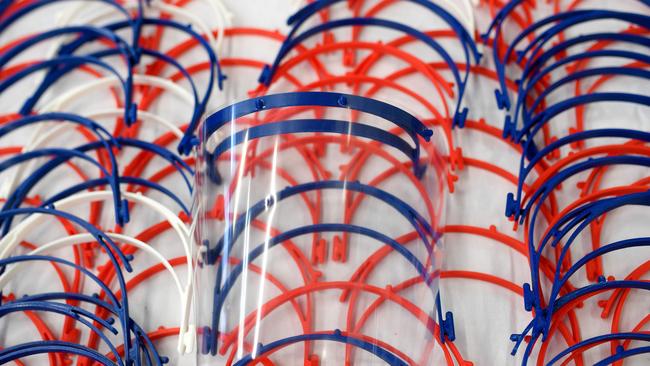 Self-made protection visors are seen at workshop of the University Hospital of Essen, western Germany. Picture: AFP