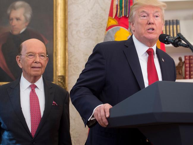US President Donald Trump speaks alongside Secretary of Commerce Wilbur Ross. Picture: AFP