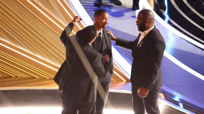 Denzel Washington, and Tyler Perry comfort Will Smith during the show at the 94th Academy Awards at the Dolby Theatre at Ovation Hollywood on Sunday. Picture: Myung Chun / Los Angeles Times via Getty Images)