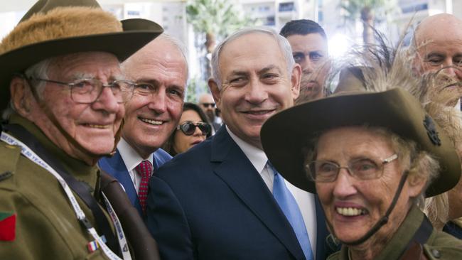 Australian Prime Minister Malcolm Turnbull, centre left, with Israeli Prime Minister Benjamin Netanyahu, centre right, with two Australians wearing uniforms from the 4th Australian Light Horse Brigade from World War I, including Avon Moffatt, right, from Armidale