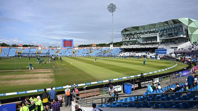 G4S event security staff stand by the boundary as players warm up on day one of the third Ashes cricket Test match between England and Australia at Headingley cricket ground in Leeds. Picture: AFP