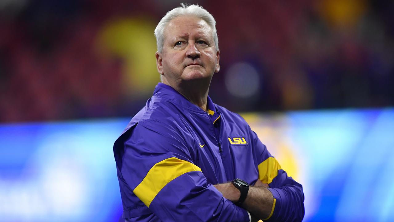 LSU Offensive Coordinator Steve Ensminger watches the warm-ups after his daughter-in-law was involved in a plane crash hours before the game. (AP Photo/John Amis)