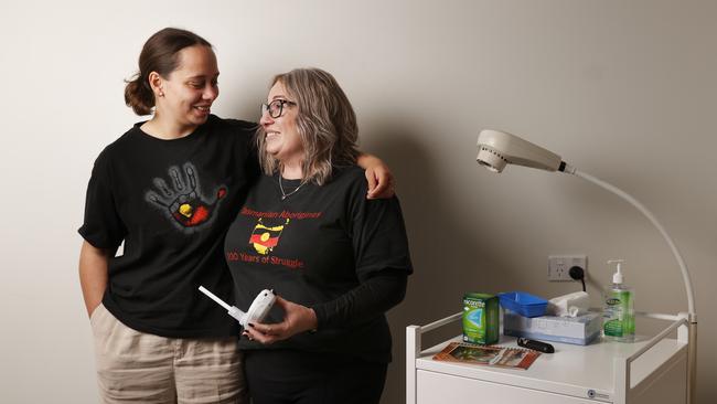 Client Sienna Scotney-Barron with Tina Goodwin TAC alcohol and other drugs coordinator. The Tasmanian Aboriginal Centre (TAC) is on a mission to reduce smoking rates and drive better health outcomes for Aboriginal communities, with the rollout of new Smokerlyzer technology across its five health clinics around the state. Picture: Nikki Davis-Jones
