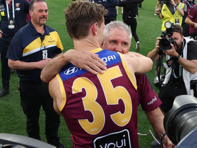 Ryan Lester and Chris Fagan celebrate winning the AFL Grand Final after defeating the Sydney Swans at the MCG. Picture Lachie Millard