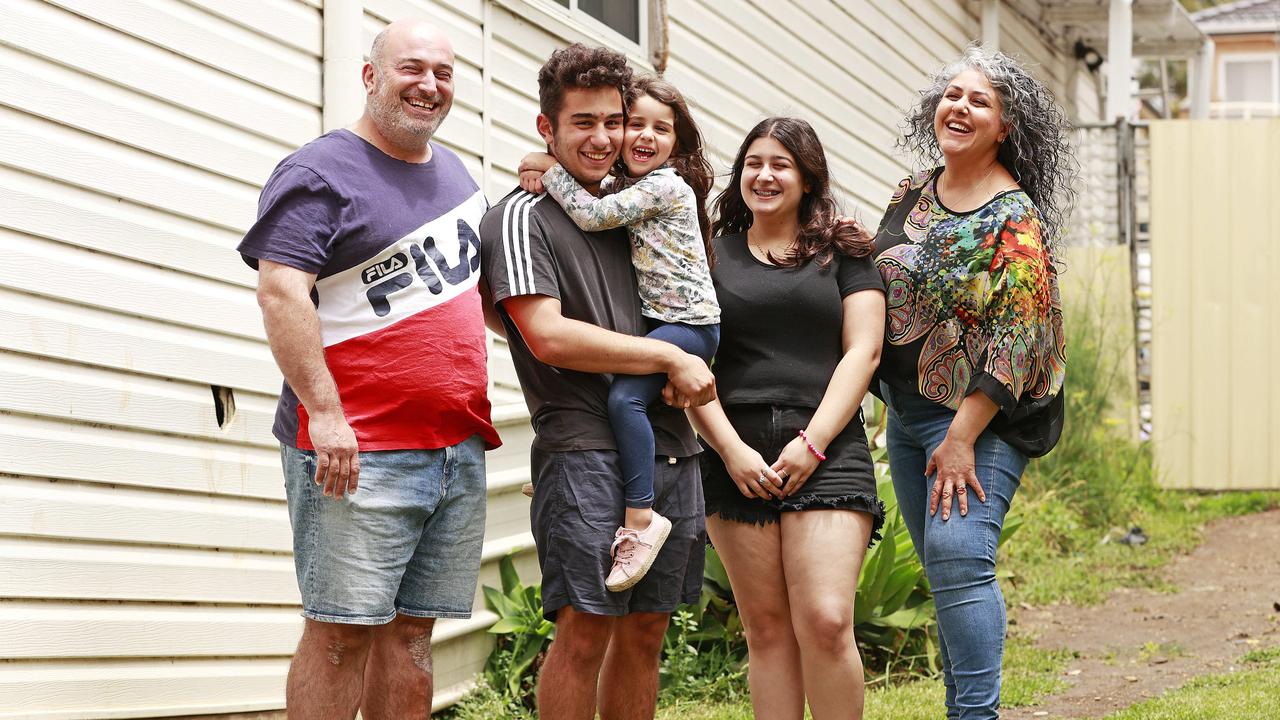 Tas Theoharis, with wife Suzie and kids Elias, Kailani and Genevieve, recently refinanced. Picture: Tim Hunter.