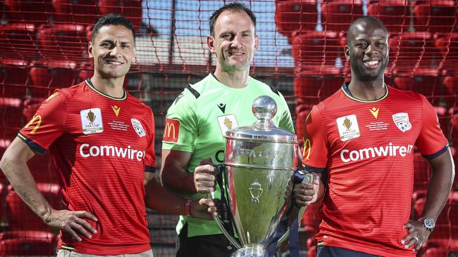 Adelaide United legends Marcelo Carrusca, Eugene Galekovic and Bruce Djite at Hindmarsh Stadium. Picture: Sarah Reed