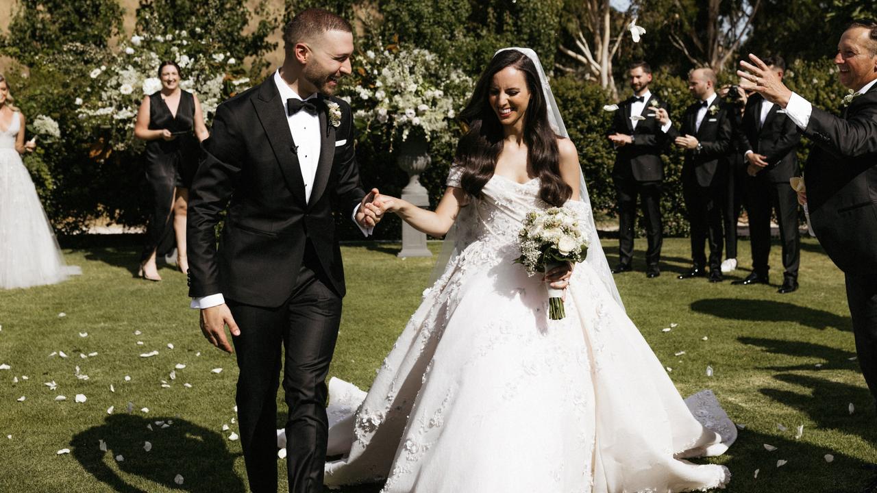 Paul Vasileff and wife Anna Frangiosa on their wedding day. Picture: Dan Evans Photography