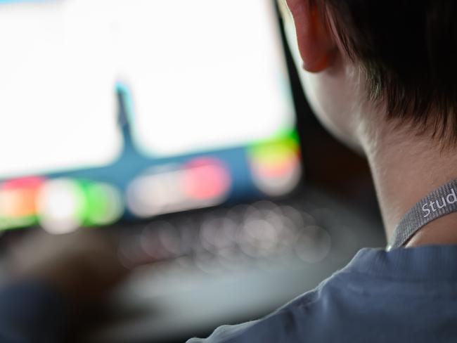 LONDON, ENGLAND - JANUARY 17: In this photo illustration, a teenage child looks at a screen of age-restricted content on a laptop screen on January 17, 2023 in London, England. The Bill aims to protect young and vulnerable viewers by introducing new rules for social media companies which host user-generated content, and for search engines, which will have tailored duties focussed on minimising the presentation of harmful search results. Content that platforms will need to remove includes child sexual abuse material, revenge pornography, selling illegal drugs or weapons, and terrorism. (Photo by Leon Neal/Getty Images)