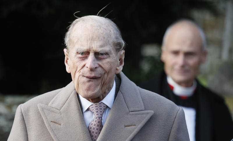  Britain's Prince Philip leaves after attending a Christmas day church service in Sandringham, England.