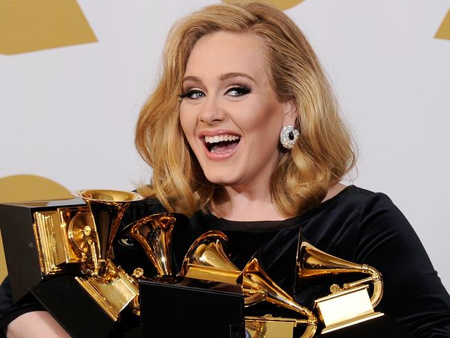 LOS ANGELES, CA - FEBRUARY 12: Singer Adele, winner of six GRAMMYs, poses in the press room at the 54th Annual GRAMMY Awards at Staples Center on February 12, 2012 in Los Angeles, California. (Photo by Kevork Djansezian/Getty Images)