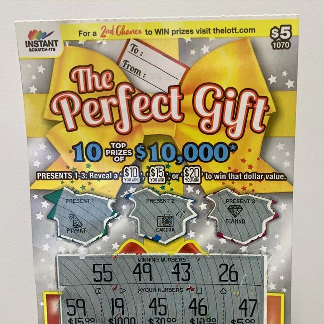 The $5 Perfect Gift winning ticket purchased from East Devonport Newsagency &amp; Lotto.