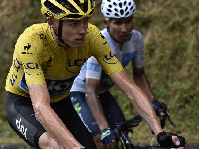 Great Britain's Christopher Froome (L), wearing the overall leader's yellow jersey, and Colombia's Nairo Quintana, wearing the best young's white jersey, ride during the 195 km twelfth stage of the 102nd edition of the Tour de France cycling race on July 16, 2015, between Lannemezan and Plateau de Beille, southern France. AFP PHOTO / ERIC FEFERBERG