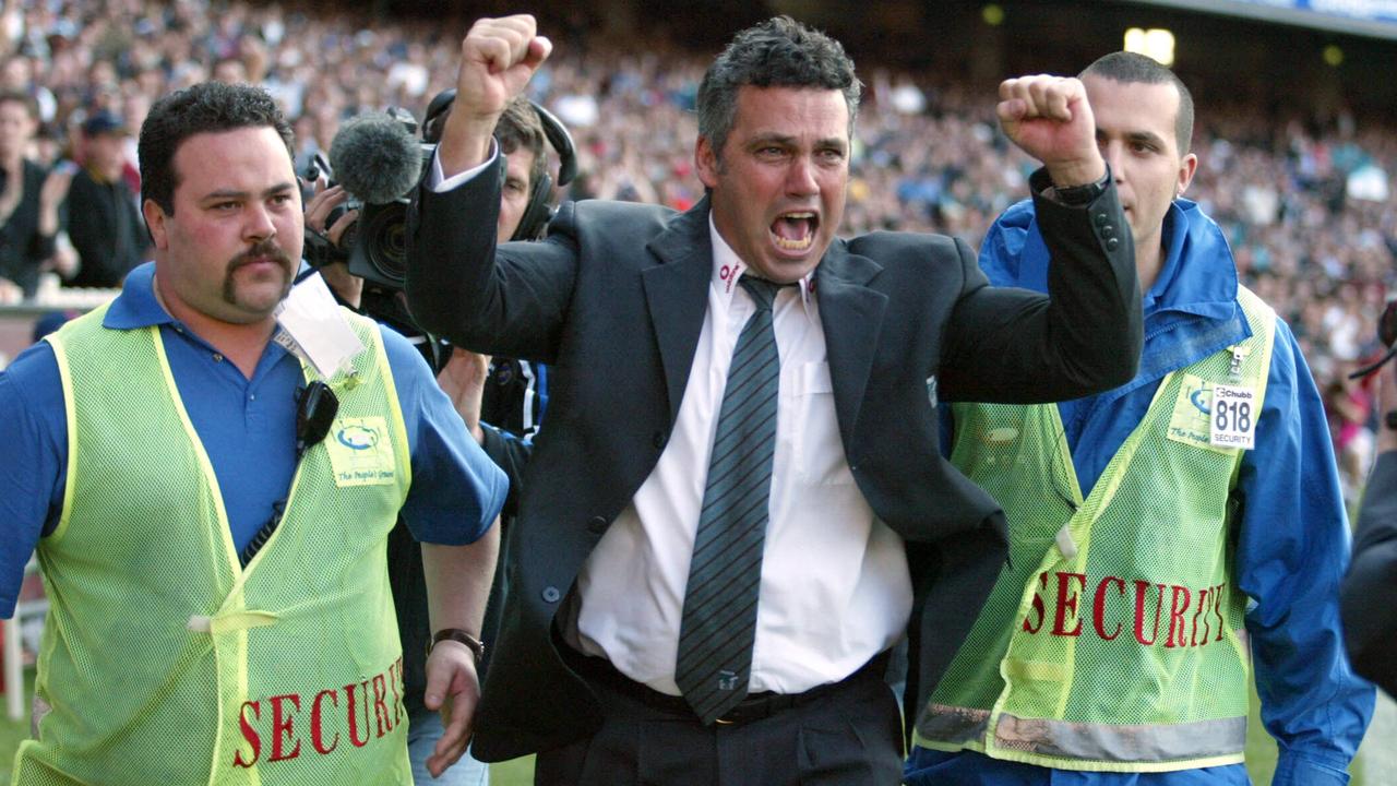 Port coach Mark Williams celebrates on the final siren following the Port Adelaide v Brisbane Lions AFL Grand Final at the MCG in Melbourne.